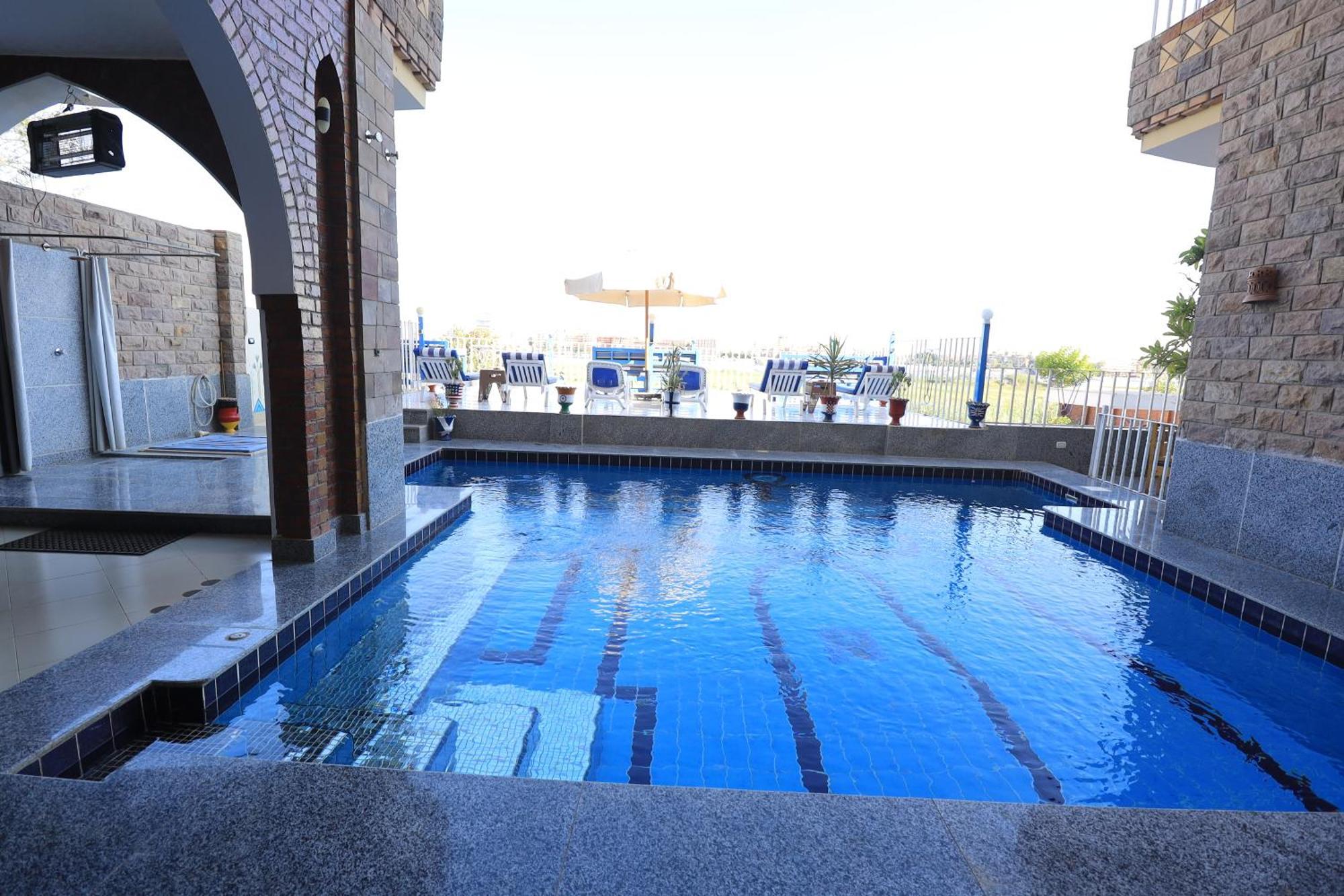 Апартаменти Blue Nile House Луксор Номер фото